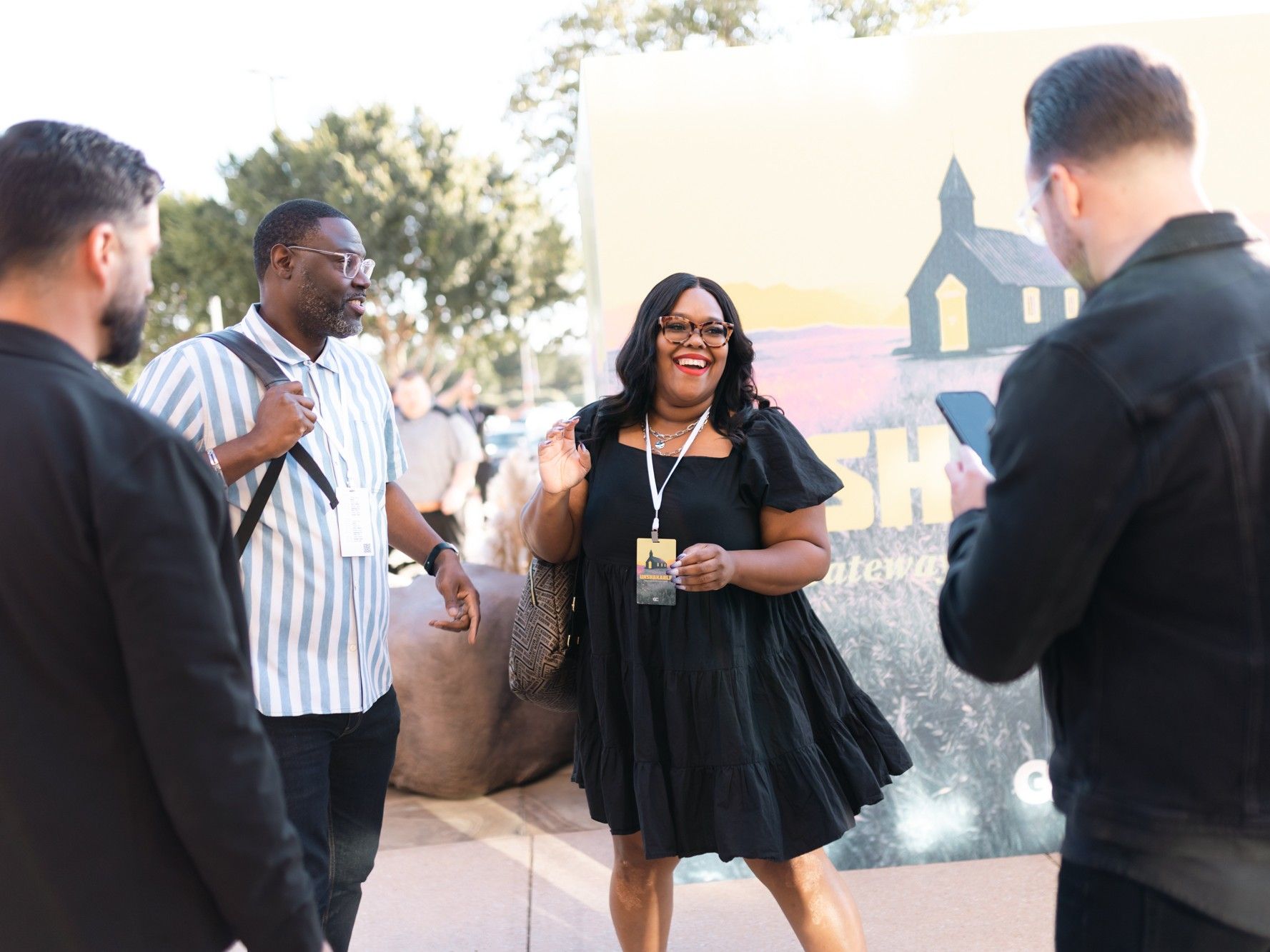 Woman smiling talking to a group