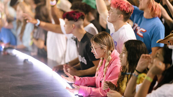 Group of students next to stage